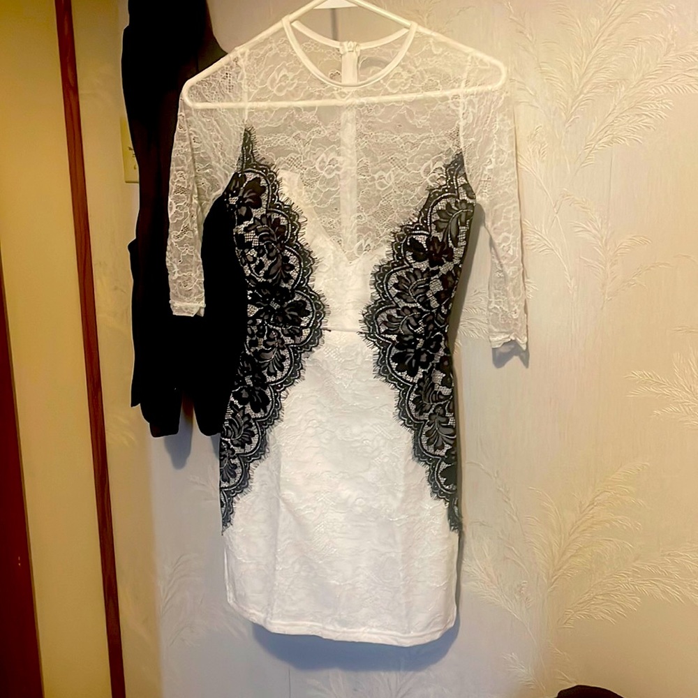 White and black lace dress.